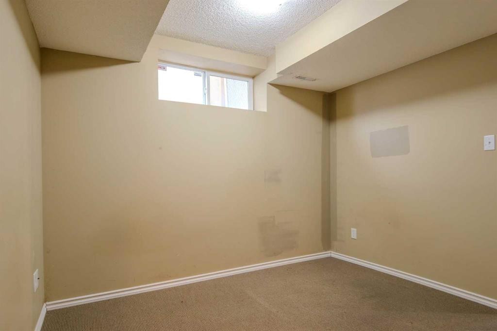 161 Saddlecrest Close Ne, Calgary, AB - Indoor Photo Showing Other Room