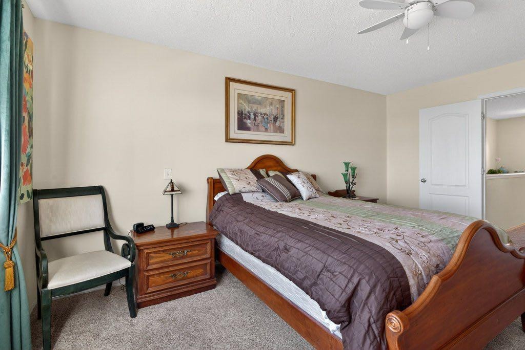 92 Hamptons Link Nw, Calgary, AB - Indoor Photo Showing Bedroom