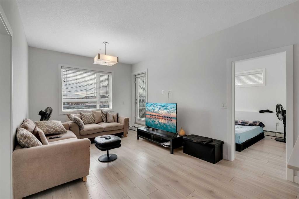 2225-76 Cornerstone Passage Ne, Calgary, AB - Indoor Photo Showing Living Room