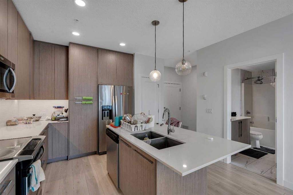 2225-76 Cornerstone Passage Ne, Calgary, AB - Indoor Photo Showing Kitchen With Stainless Steel Kitchen With Double Sink With Upgraded Kitchen
