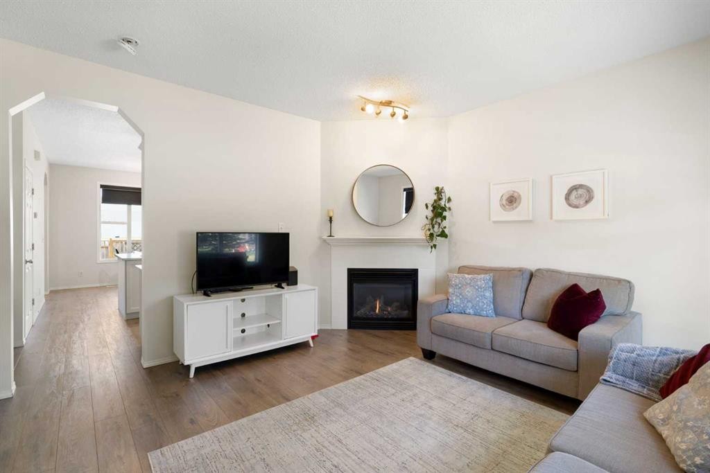 47 Covehaven Mews Ne, Calgary, AB - Indoor Photo Showing Living Room With Fireplace