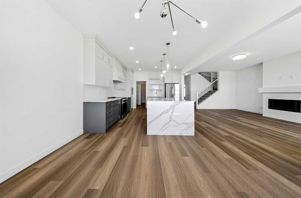 152 Copperhead Road Se, Calgary, AB - Indoor With Fireplace
