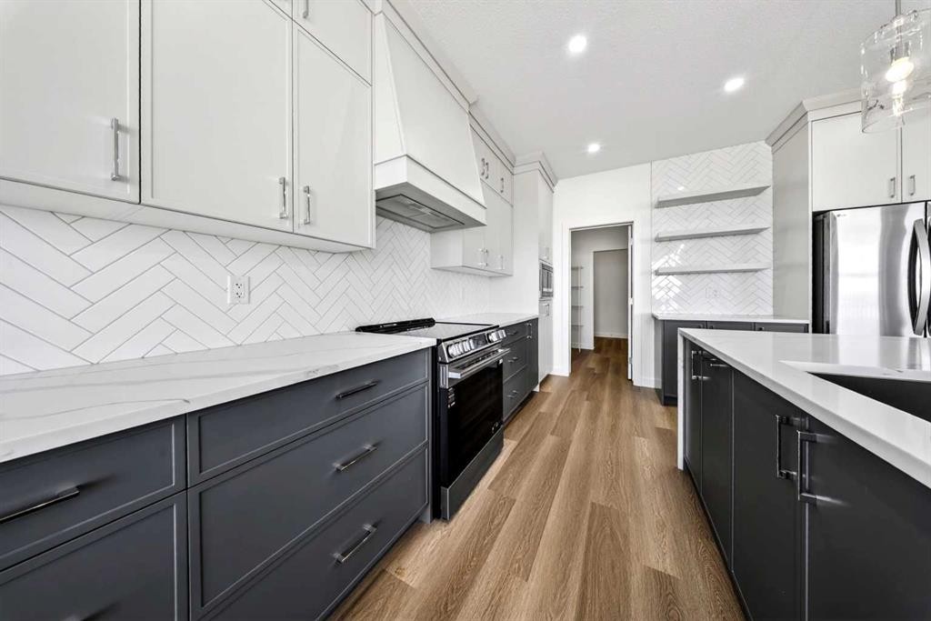 152 Copperhead Road Se, Calgary, AB - Indoor Photo Showing Kitchen With Upgraded Kitchen