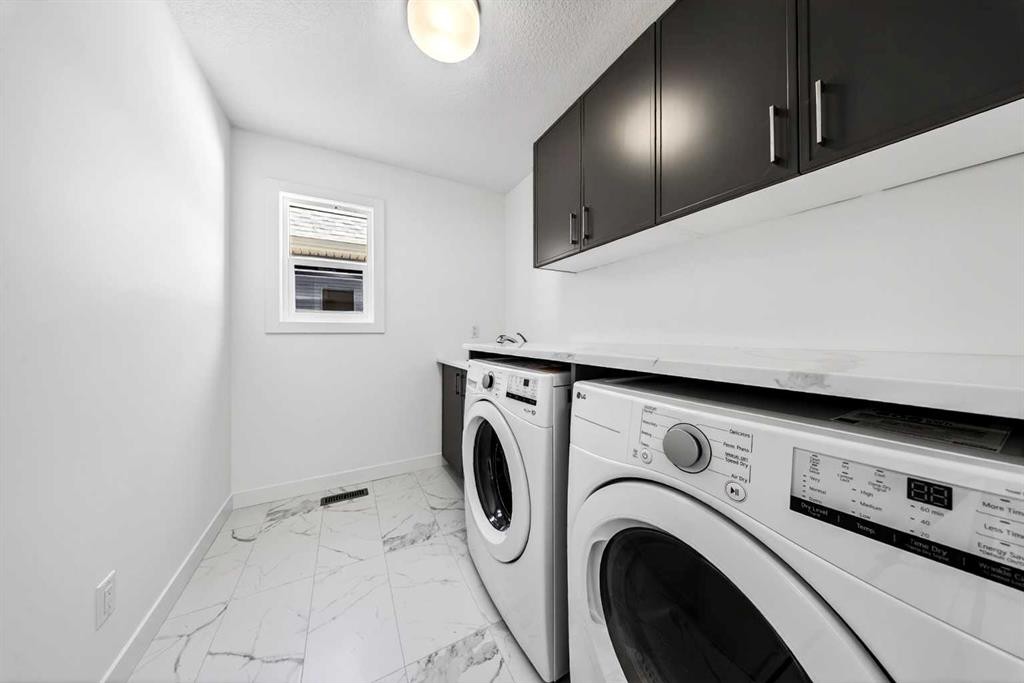 152 Copperhead Road Se, Calgary, AB - Indoor Photo Showing Laundry Room