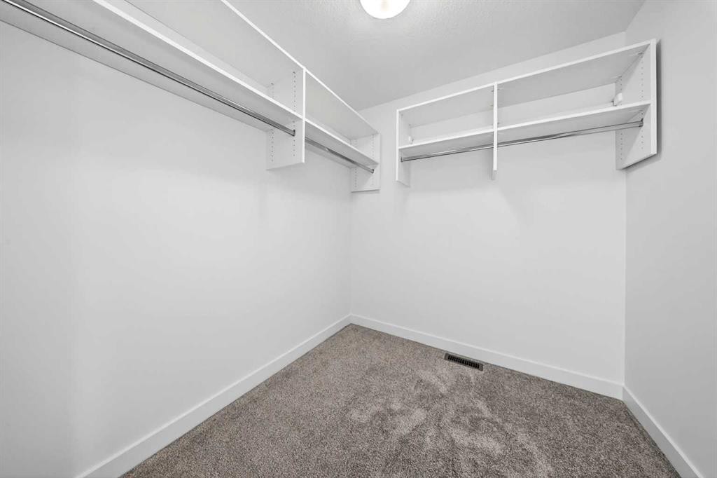 152 Copperhead Road Se, Calgary, AB - Indoor With Storage