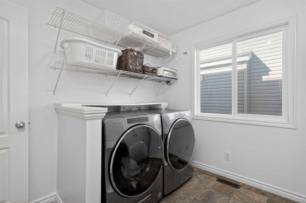 268 Westmount Crescent, Okotoks, AB - Indoor Photo Showing Laundry Room