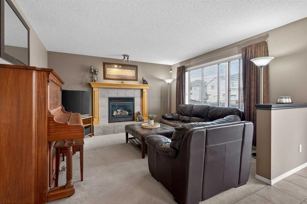 204 Citadel Meadow Close Nw, Calgary, AB - Indoor Photo Showing Living Room With Fireplace