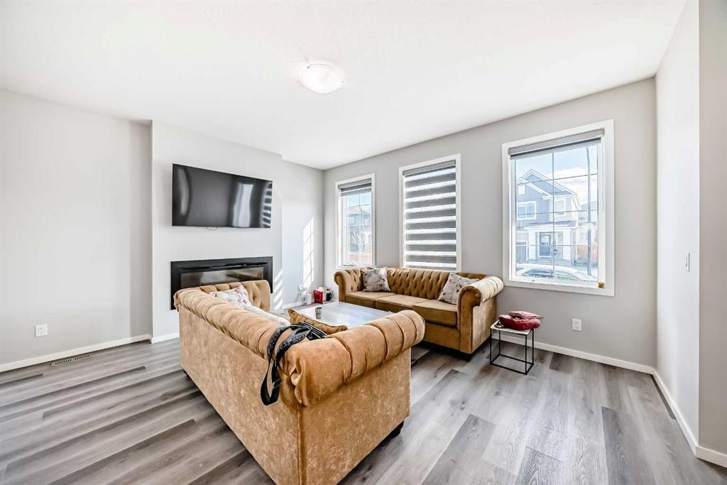 126 Cityspring Gate Ne, Calgary, AB - Indoor Photo Showing Living Room With Fireplace