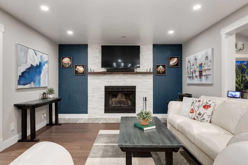9915 Patton Road Sw, Calgary, AB - Indoor Photo Showing Living Room With Fireplace