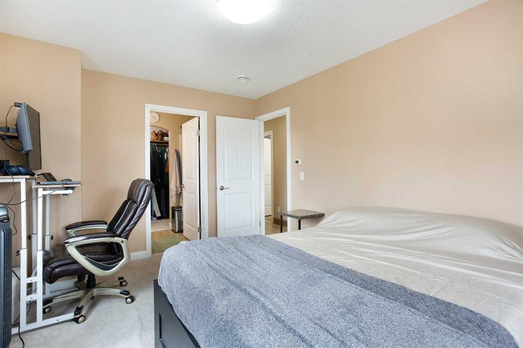 2201-230 Eversyde Boulevard Sw, Calgary, AB - Indoor Photo Showing Bedroom