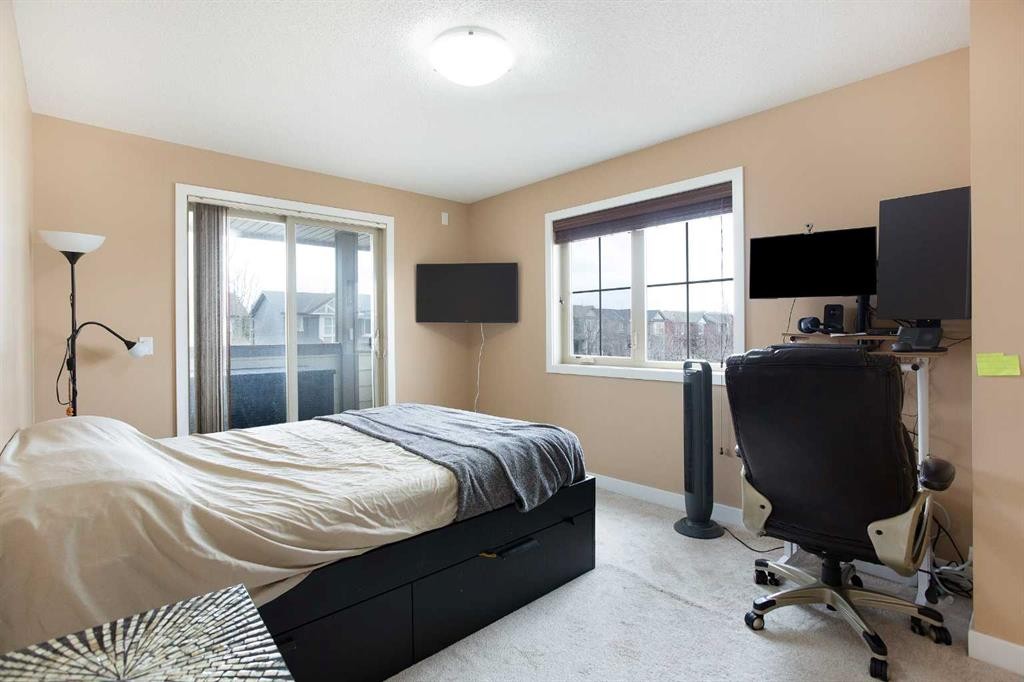 2201-230 Eversyde Boulevard Sw, Calgary, AB - Indoor Photo Showing Bedroom
