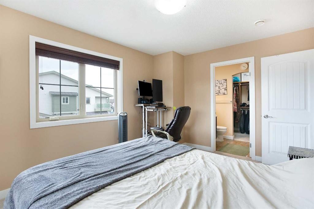 2201-230 Eversyde Boulevard Sw, Calgary, AB - Indoor Photo Showing Bedroom