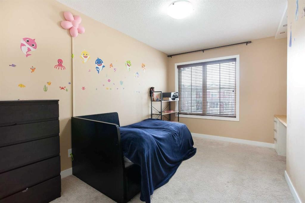 2201-230 Eversyde Boulevard Sw, Calgary, AB - Indoor Photo Showing Bedroom
