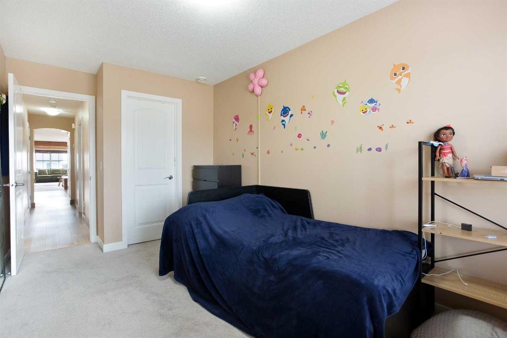 2201-230 Eversyde Boulevard Sw, Calgary, AB - Indoor Photo Showing Bedroom