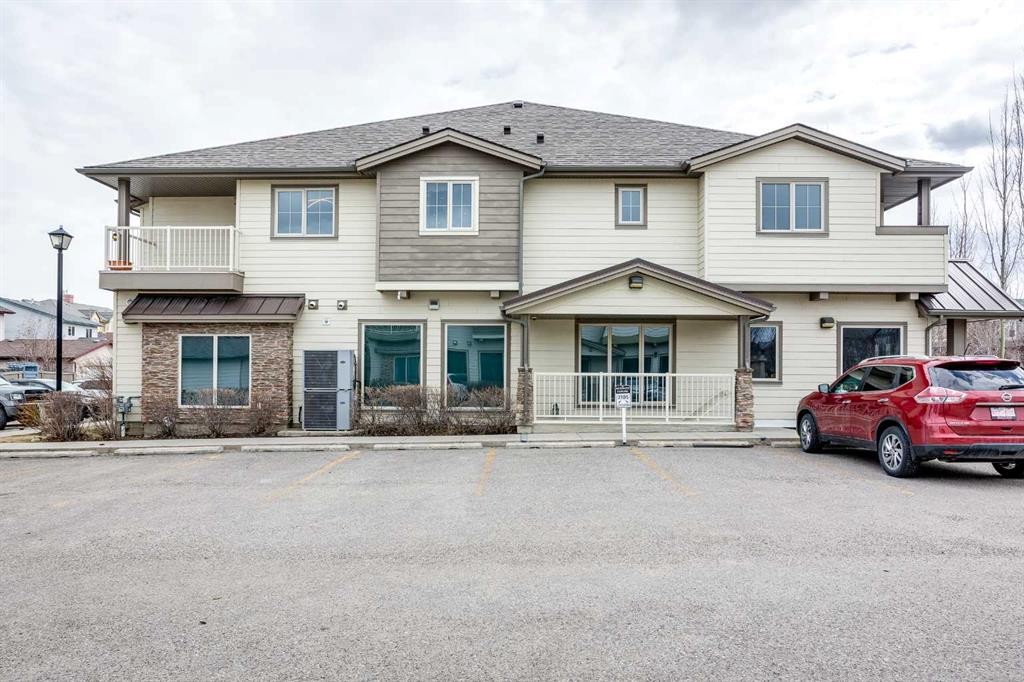 2201-230 Eversyde Boulevard Sw, Calgary, AB - Outdoor With Facade