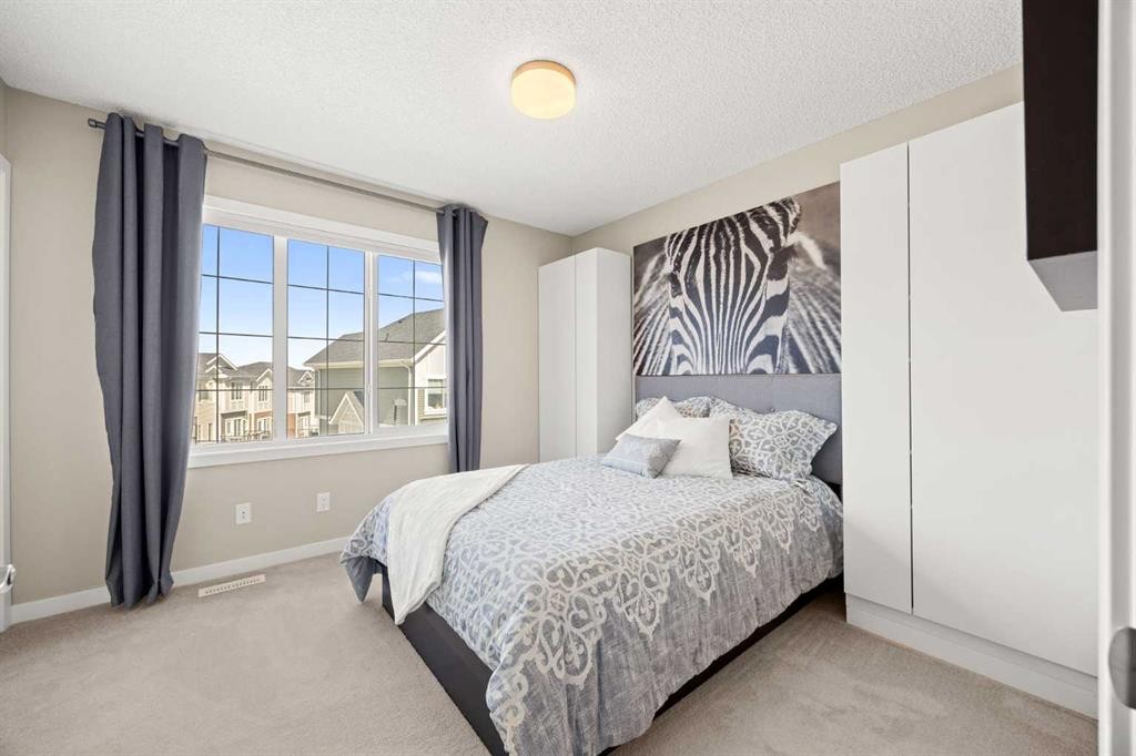 496 Nolan Hill Boulevard Nw, Calgary, AB - Indoor Photo Showing Bedroom