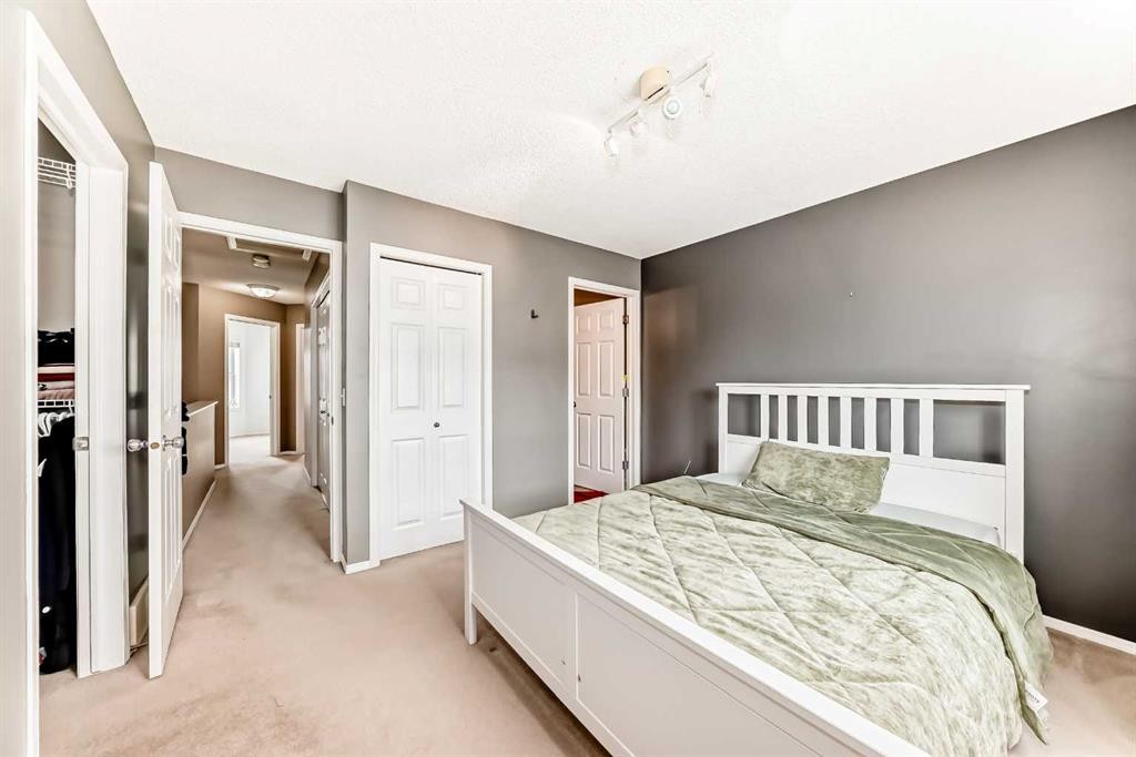 112 Country Village Cape Ne, Calgary, AB - Indoor Photo Showing Bedroom