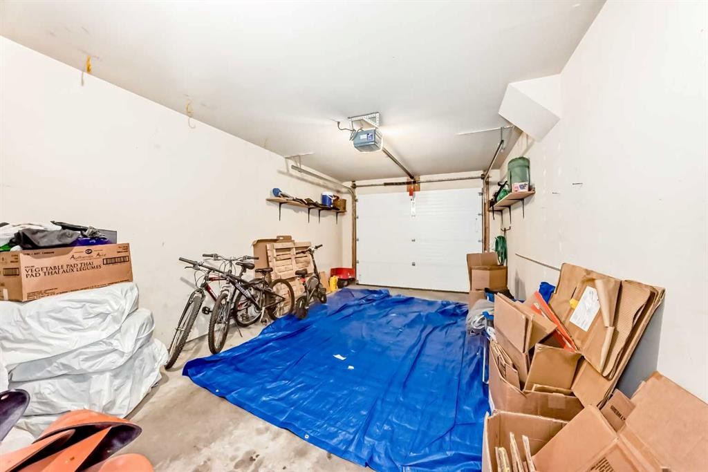 112 Country Village Cape Ne, Calgary, AB - Indoor Photo Showing Garage