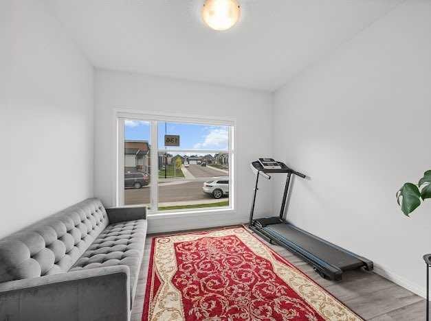 136 Lucas Street Nw, Calgary, AB - Indoor Photo Showing Gym Room