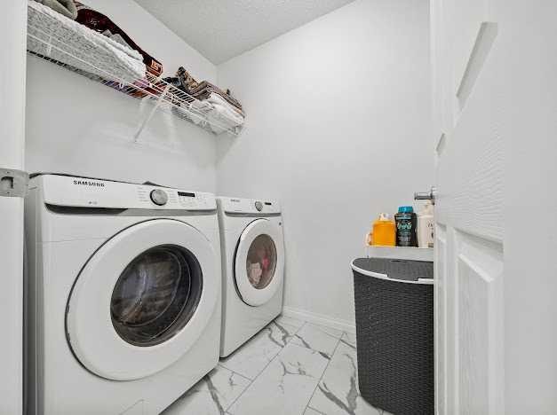 136 Lucas Street Nw, Calgary, AB - Indoor Photo Showing Laundry Room