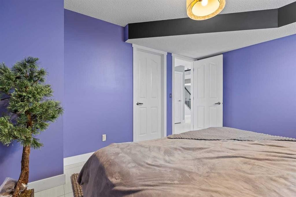 12 Arbour Estates Green Nw, Calgary, AB - Indoor Photo Showing Bedroom