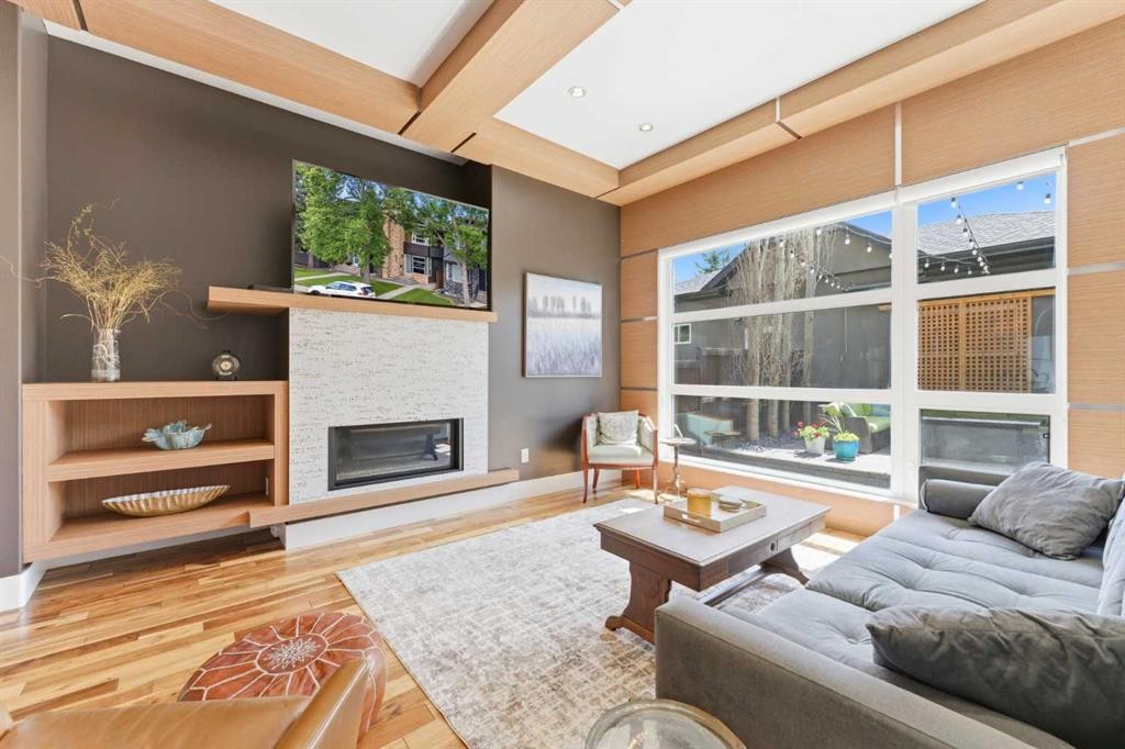2027 42 Avenue Sw, Calgary, AB - Indoor Photo Showing Living Room With Fireplace
