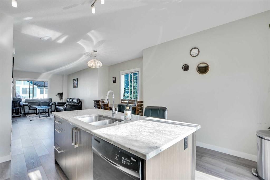 1107-333 Taralake Way Ne, Calgary, AB - Indoor Photo Showing Kitchen With Double Sink