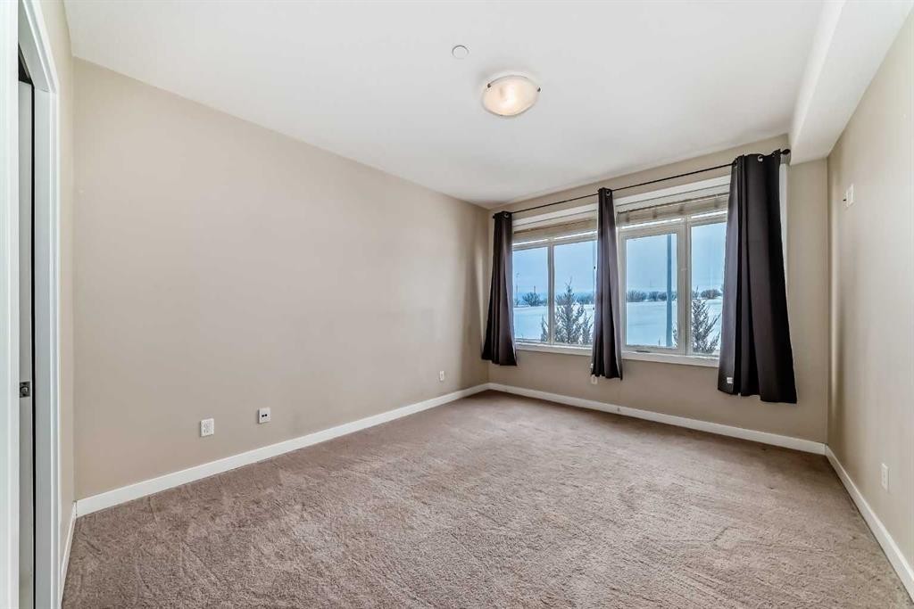 206-1005B Westmount Drive, Strathmore, AB - Indoor Photo Showing Other Room