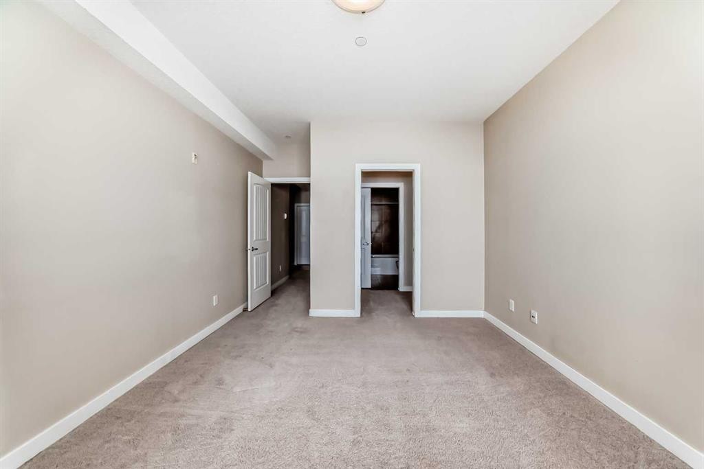 206-1005B Westmount Drive, Strathmore, AB - Indoor Photo Showing Other Room