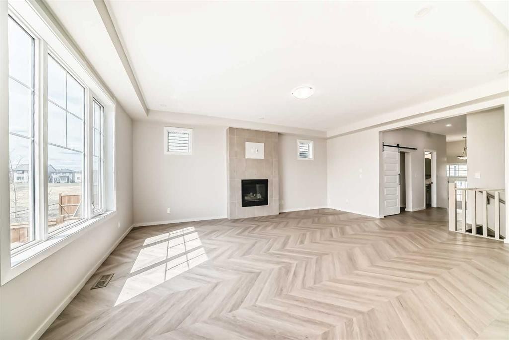 641 Windrow Manor Sw, Airdrie, AB - Indoor With Fireplace