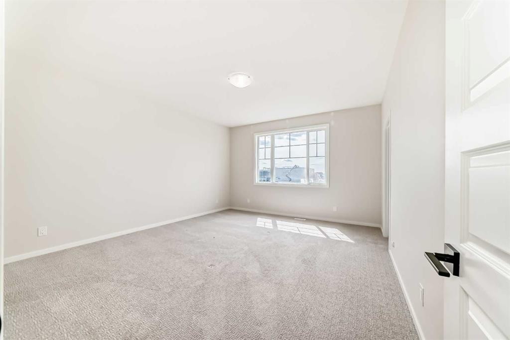 641 Windrow Manor Sw, Airdrie, AB - Indoor Photo Showing Other Room