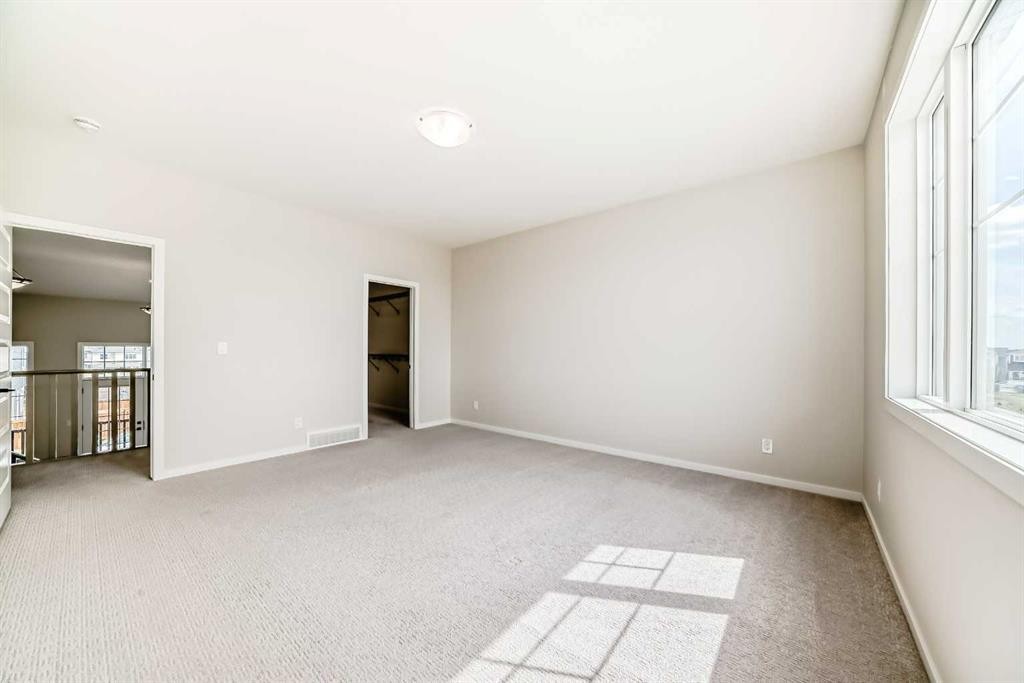 641 Windrow Manor Sw, Airdrie, AB - Indoor Photo Showing Other Room