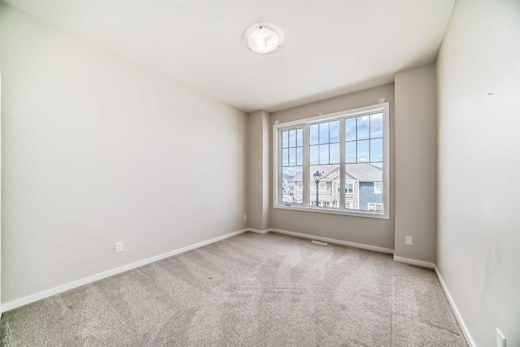 641 Windrow Manor Sw, Airdrie, AB - Indoor Photo Showing Other Room