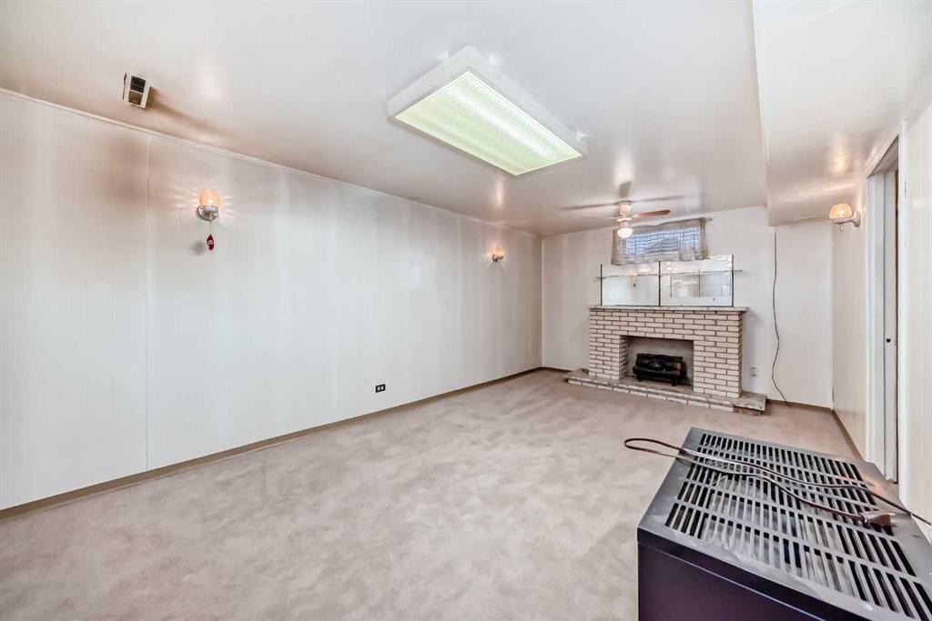 1527 49 Street Se, Calgary, AB - Indoor With Fireplace