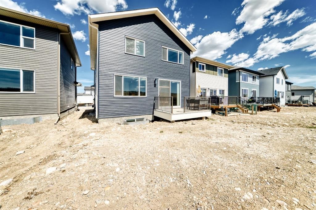 80 Vantage Drive, Cochrane, AB - Outdoor With Deck Patio Veranda With Exterior
