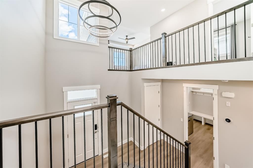 80 Vantage Drive, Cochrane, AB - Indoor Photo Showing Kitchen With Double Sink With Upgraded Kitchen