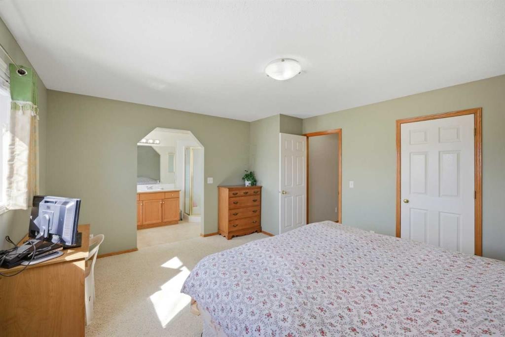 39 Saddlemont Close Ne, Calgary, AB - Indoor Photo Showing Bedroom
