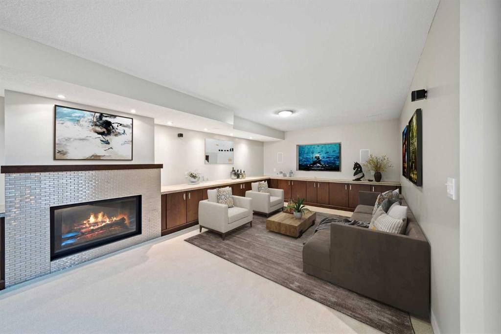 159 Malibou Road Sw, Calgary, AB - Indoor Photo Showing Living Room With Fireplace