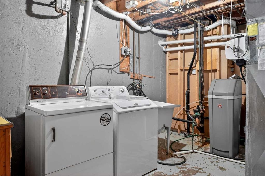 2416 38 Street Sw, Calgary, AB - Indoor Photo Showing Laundry Room