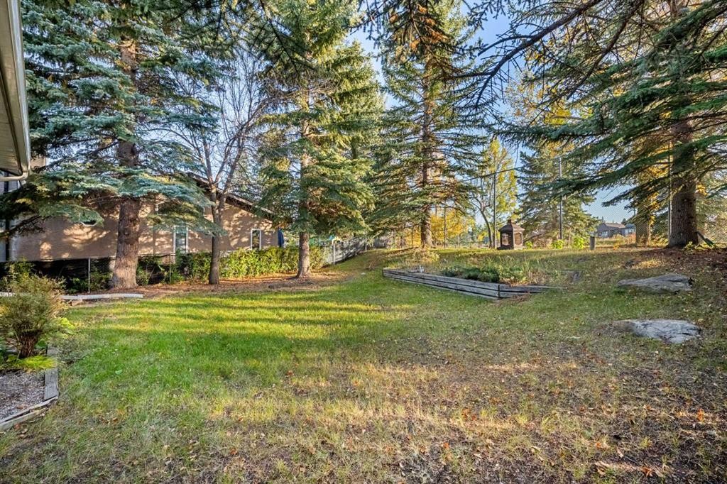 907 Shawnee Drive Sw, Calgary, AB - Outdoor