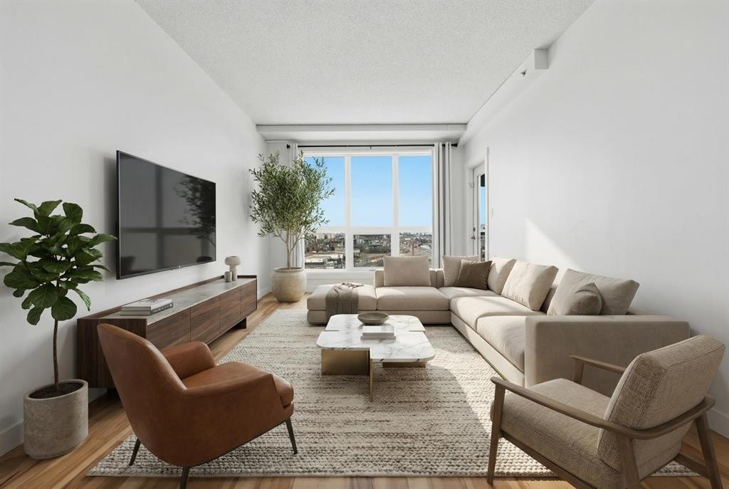 1507-8710 Horton Road Sw, Calgary, AB - Indoor Photo Showing Living Room