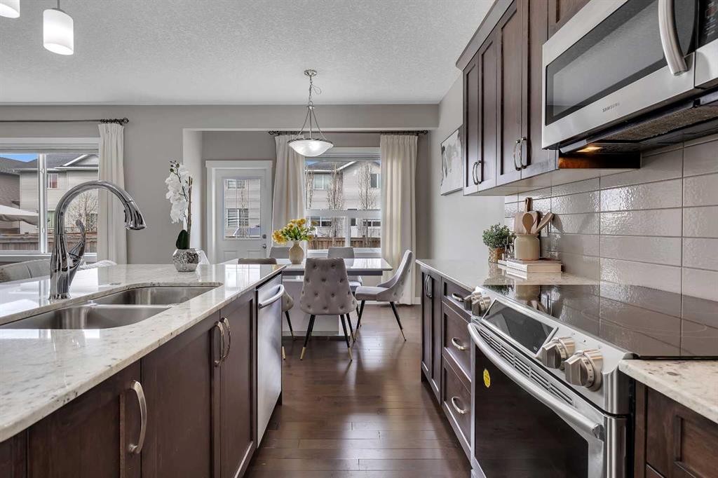 175 Brightoncrest Point Se, Calgary, AB - Indoor Photo Showing Kitchen With Double Sink With Upgraded Kitchen