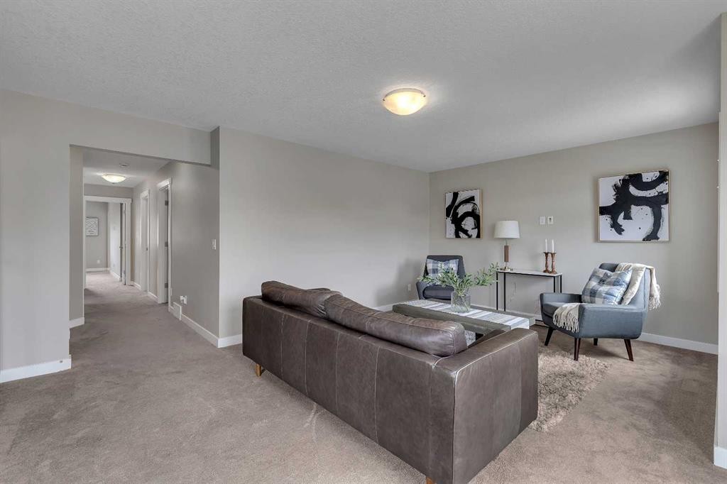 175 Brightoncrest Point Se, Calgary, AB - Indoor Photo Showing Living Room