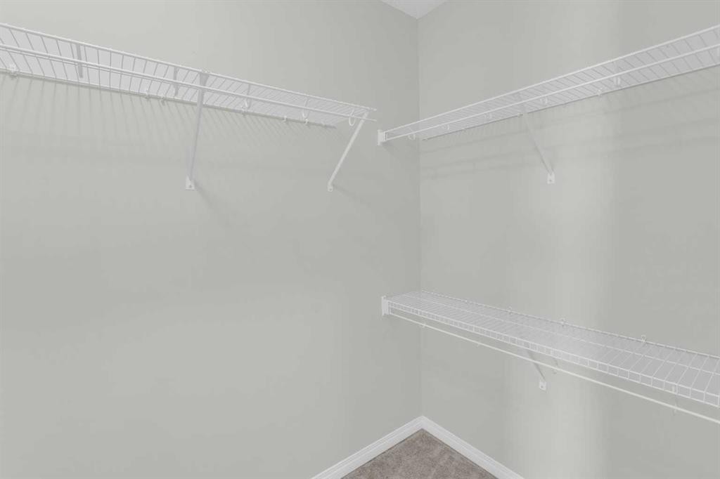 140 Sundown Road, Cochrane, AB - Indoor With Storage