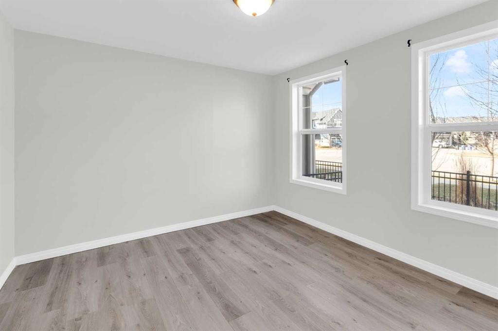 140 Sundown Road, Cochrane, AB - Indoor Photo Showing Other Room