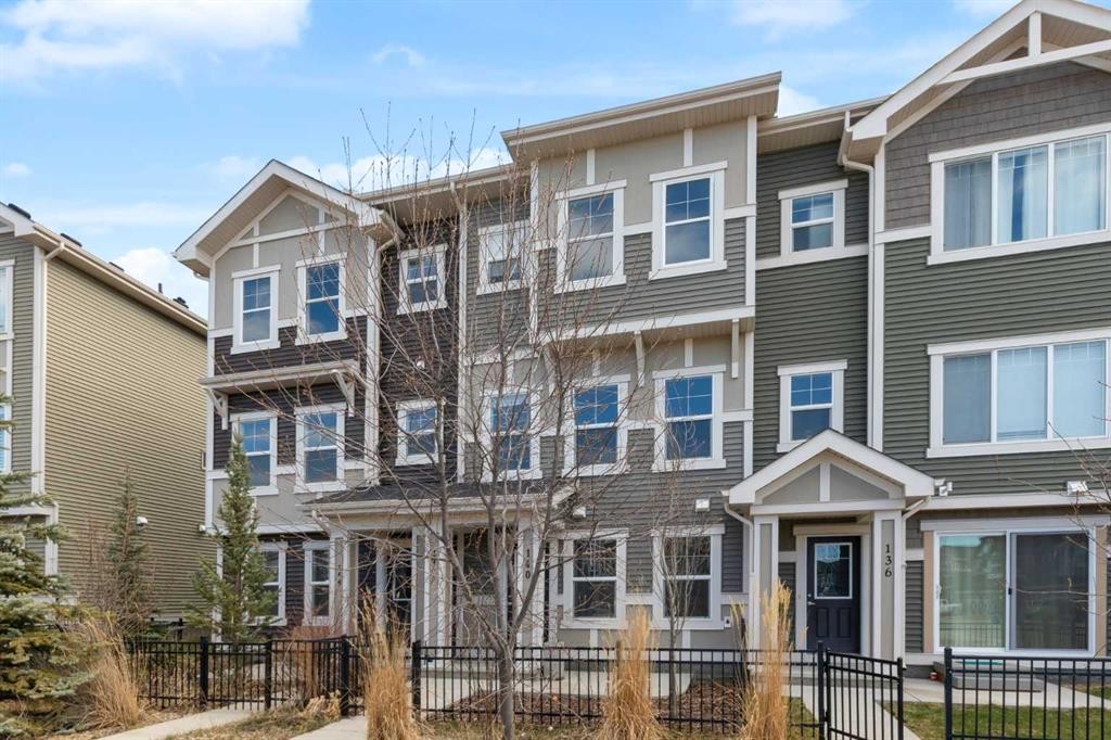 140 Sundown Road, Cochrane, AB - Outdoor With Facade