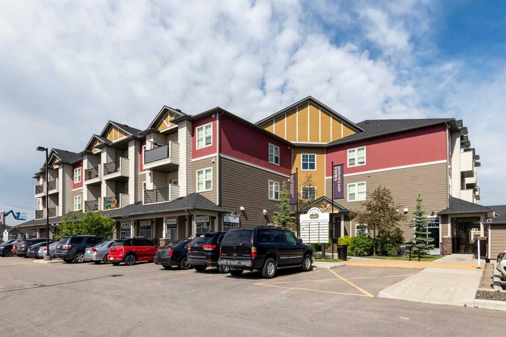 140 Sundown Road, Cochrane, AB - Outdoor With Facade