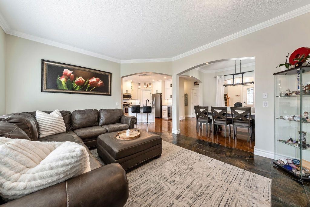 4 Cimarron Trail, Okotoks, AB - Indoor Photo Showing Living Room