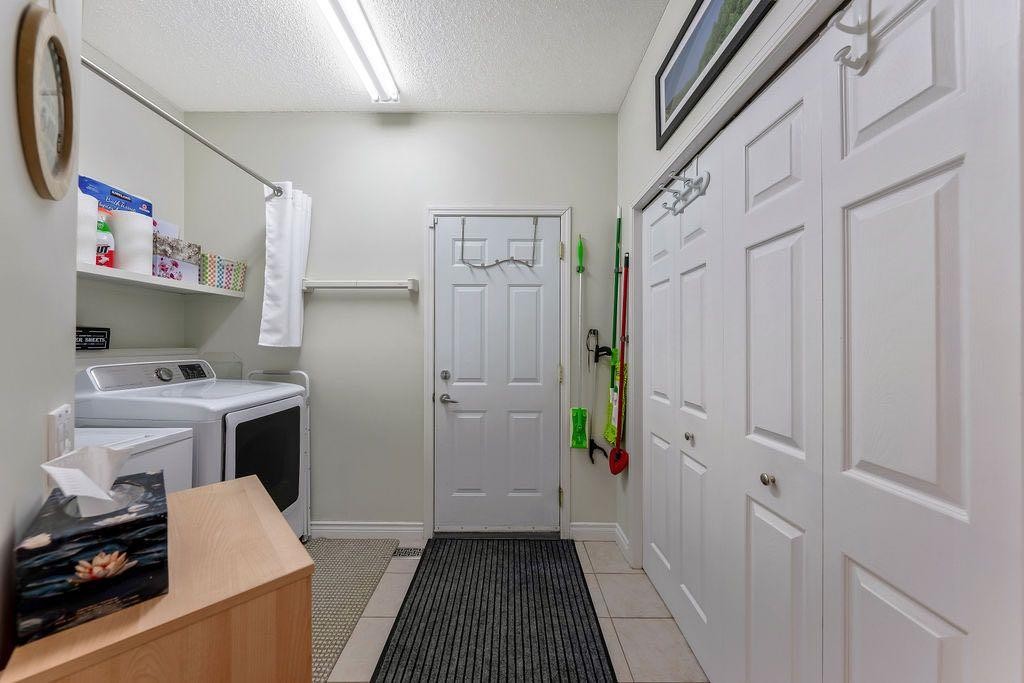 4 Cimarron Trail, Okotoks, AB - Indoor Photo Showing Laundry Room