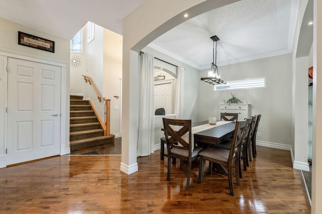4 Cimarron Trail, Okotoks, AB - Indoor Photo Showing Dining Room
